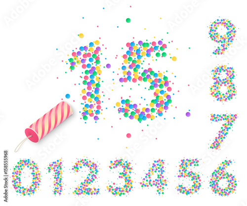 Colorful confetti in the form of numbers with a party popper for design of anniversary posters and greeting card. Holiday decorations for banners and flyers. Isolated from the background.