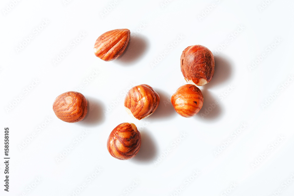 Obraz premium hazelnuts on the white