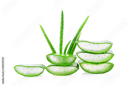 Fresh aloe vera leaf and slices isolated on white background