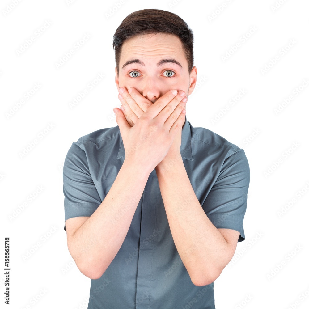 Casually handsome. Confident young handsome man while standing against white background. Happy Young Man Isolated Background. A portrait of a young man. Young man with a hush gesture, isolated Casually handsome. Confident young handsome man while standing against white background. Happy Young Man Isolated Background. A portrait of a young man. Young man with a hush gesture, isolated