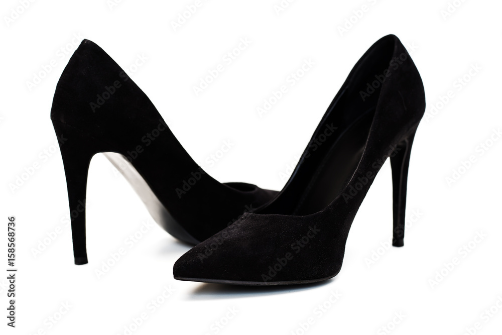 Black high heels shoes over white Black high heels shoes over white