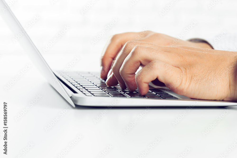 Businessman working on laptop. On the table Businessman working on laptop. On the table