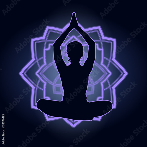 Silhouette of a woman doing yoga exercises. Neon mandala on the background. Vector image.