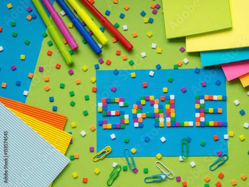 Fototapeta Naklejka Na Ścianę i Meble -  Colorful SALE words with part of color pencil tips shown in the frame. Concept of back to school, preparation,routine,sale and discount.