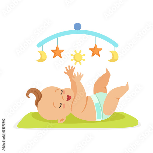 Cute happy naked baby in a diaper lying in bed and having fun with toy carousel, colorful cartoon character vector Illustration