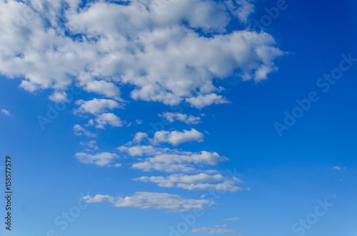 White clouds in deep blue sky