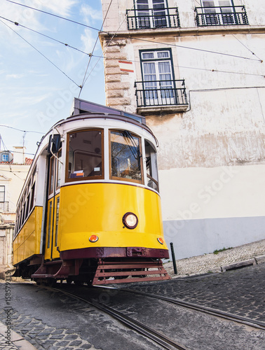 Famous vintage tram in the city center of Lisbon, Portugal in a summer day