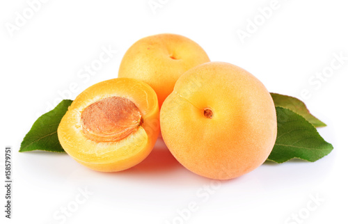 Ripe fruit for healthy life. Fresh apricot with green leaves