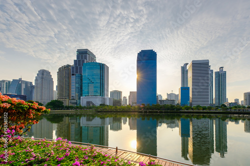 Bangkok city downtown at sunrise with reflection of skyline