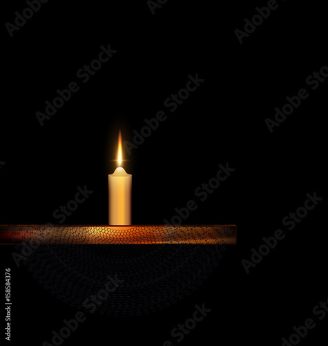 burning candle with stand and black veil