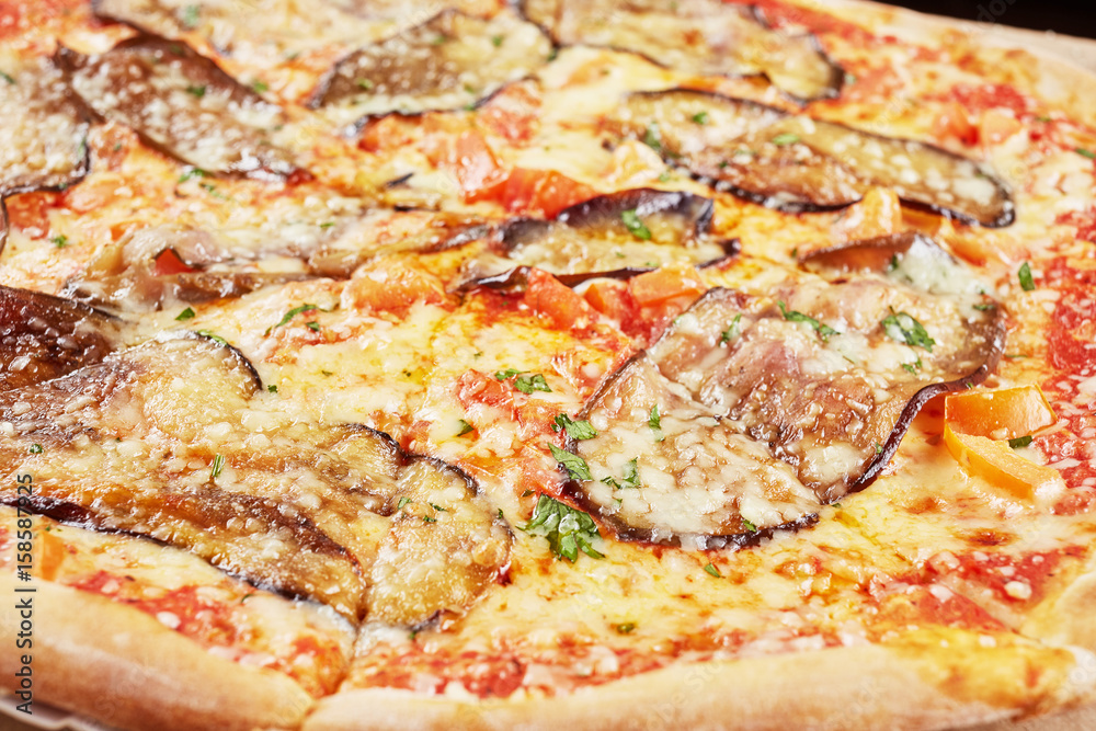 vegetable pizza with eggplant closeup macro view vegetable pizza with eggplant closeup macro view