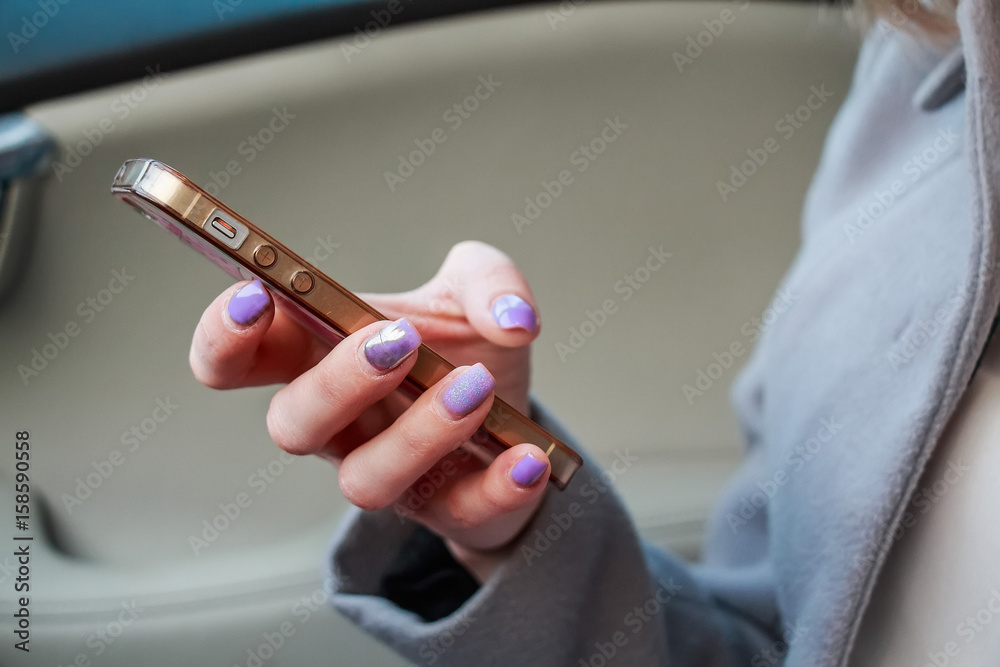 Close up woman's hands hold smartphone