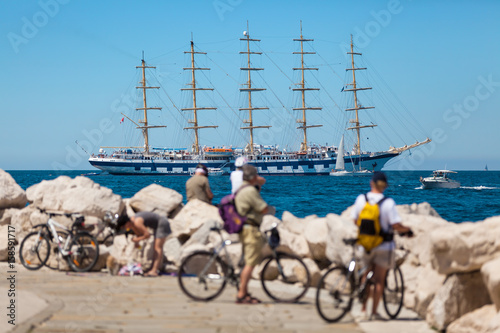 The world's largest sailing ship with five masts anchored in the open sea near old city Piran, Slovenia.