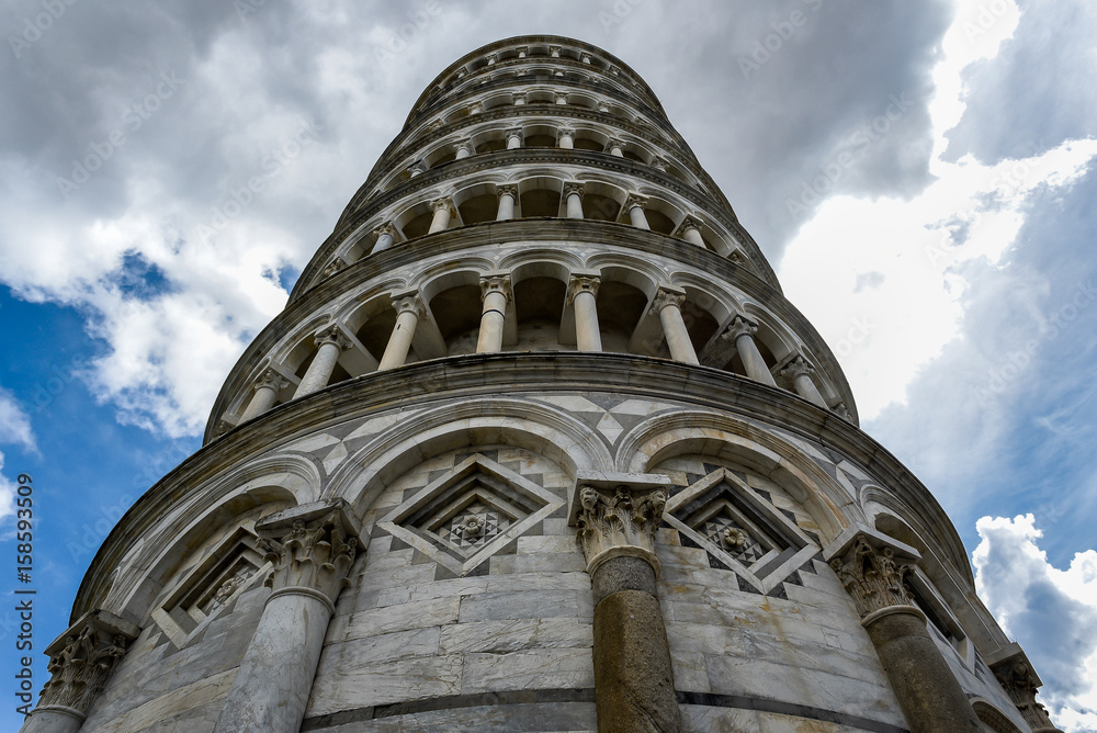 Leaning tower of Pisa in Piazza dei Miracoli in Italy photographed from below