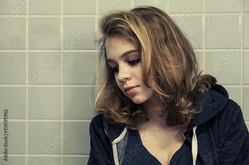 Caucasian blond teenage girl, artistic portrait photo