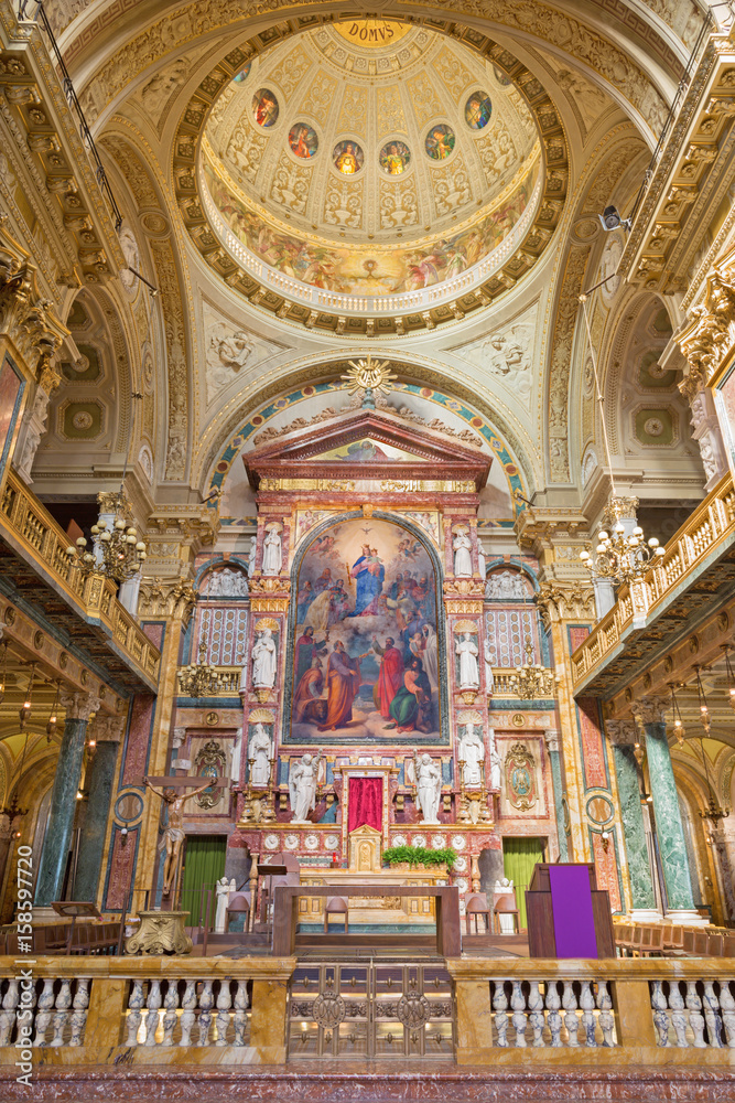 TURIN, ITALY - MARCH 15, 2017:  The Main altar and presbytery of chruch Basilica Maria Ausiliatrice withe the painting by Tommaso Lorenzone (1824  - 1902).
