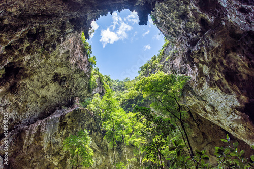 Inside cave with sunlight through hole on cave ceiling. Phraya Nakhon cave in Khao Sam Roi Yot National Park.