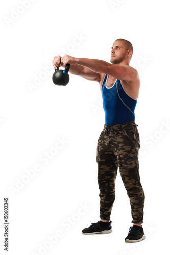 Young sporty man in sportswear doing exercise with weight, hands in position in front of him on white isolated background