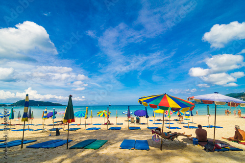 Chairs And Umbrella In Palm Sand Beach © themorningglory