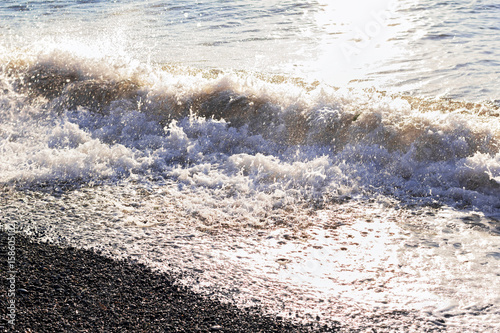 Sea surf on pebble beach