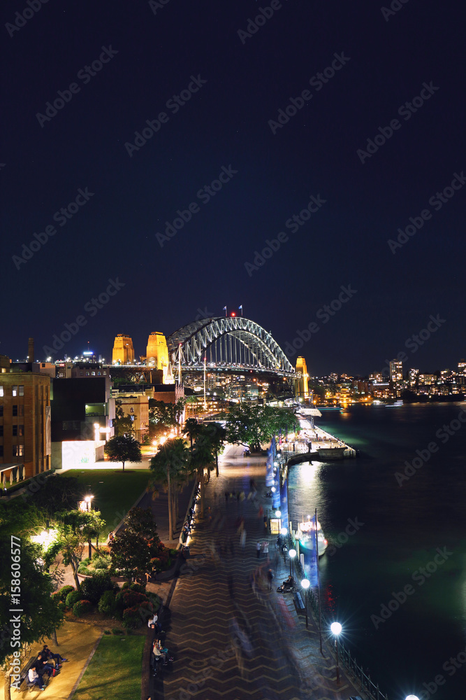 Sydney Harbour Bridge and Circular Quay view at night.
