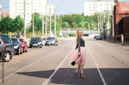 Very pretty girl walking down the street