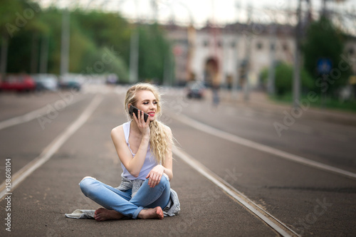 Beautiful girl talking on the phone. Lifestyle.