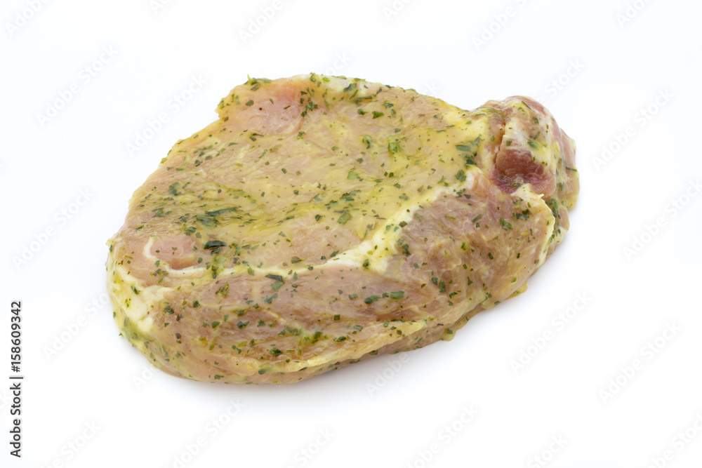 Pork chop, marinated. Isolated on the white background. Pork chop, marinated. Isolated on the white background.