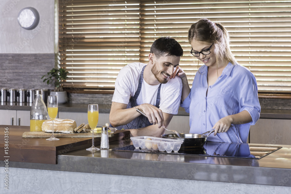 breakfast preparation kitchen cooking happy young couple breakfast preparation kitchen cooking happy young couple