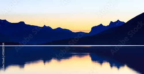 Mountains reflecting from water