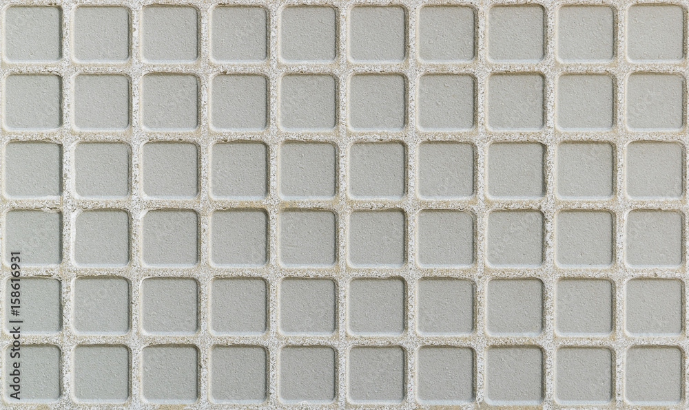 Closeup of lower surface of ceramic tile texture background.