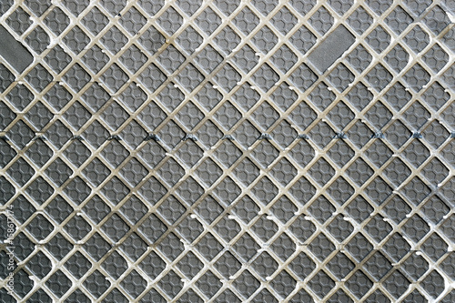 Closeup of lower surface of ceramic tile texture background.