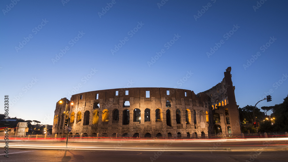 Light trails at Colosseum in Rome at dusk, Italy