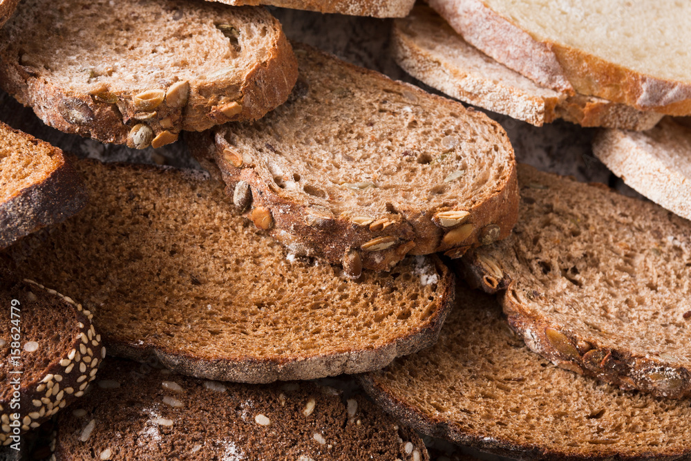 Bakery concept. Plenty of sliced bread background Bakery concept. Plenty of sliced bread background