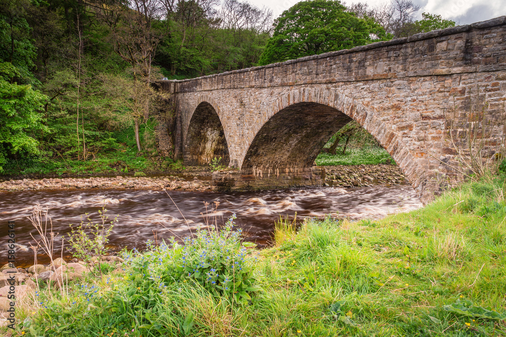 Gunnerside Road Bridge / Gunnerside Bridge to the south of the village, lies in the heart of Swaledale, a crossing over the River Swale 