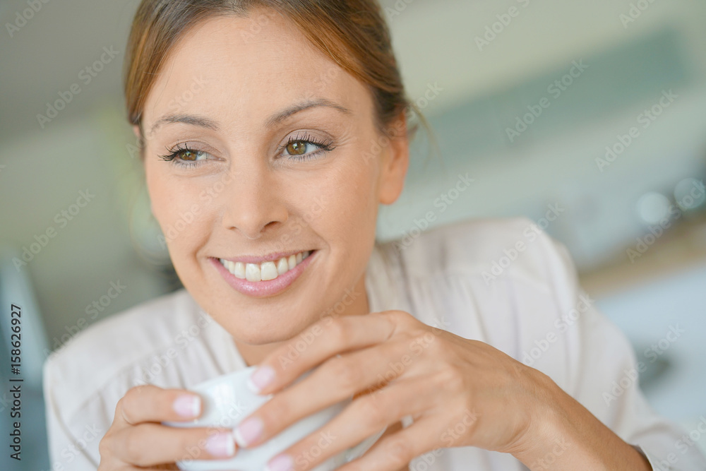 Portrait of beautiful woman at home drinking coffee Portrait of beautiful woman at home drinking coffee