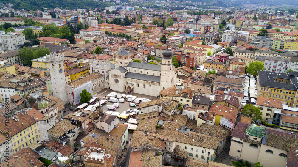 Aerial video shooting with drone on Trento, famous Trentino city near the Adige river in northern Italy