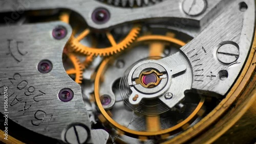 Wallpaper Mural Watch Mechanism / Clockwork / Time Keeping. Oscillating movement of an old mechanical wind up wristwatches. Macro close-up shot. Torontodigital.ca