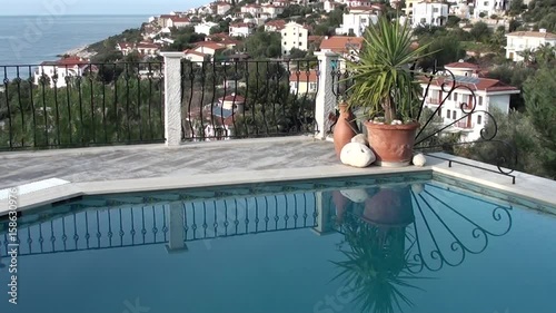 Morning swimming pool and villas photo