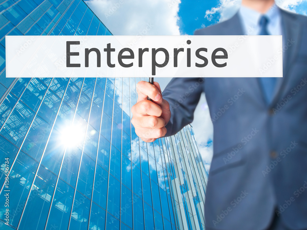 Enterprise - Businessman hand holding sign Enterprise - Businessman hand holding sign