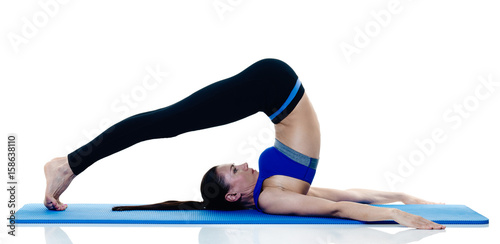 one caucasian woman exercising fitness pilates exercices isolated on white background photo