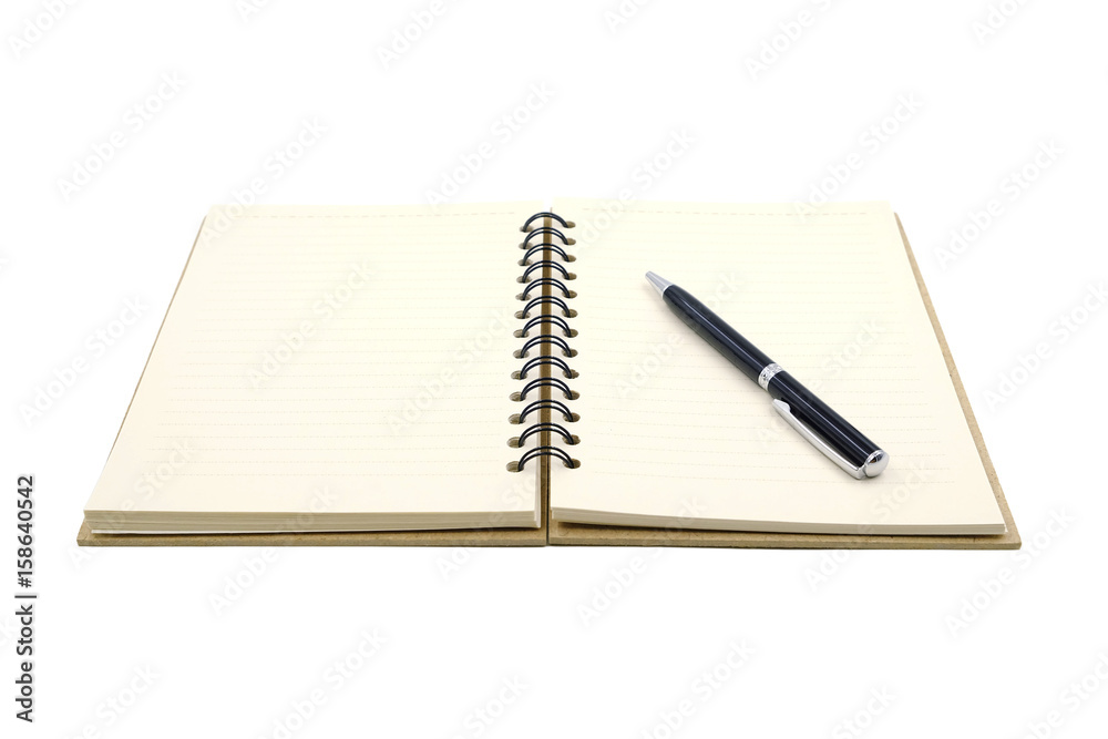 Brown notebook with a black pen on white background Brown notebook with a black pen on white background
