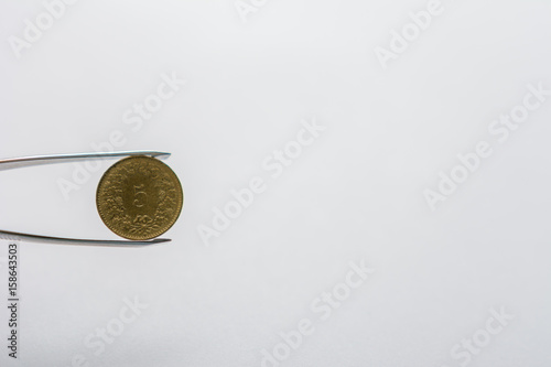 Münze in Gold - 5 Rappen stück schweizer Franken 