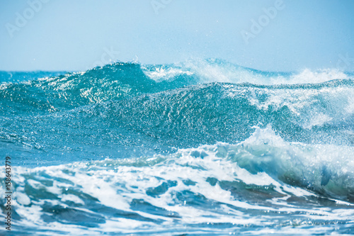 Waves barrel crashing and clear water. Blue wave in tropical sea. 