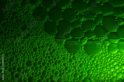 Soap bubbles green background