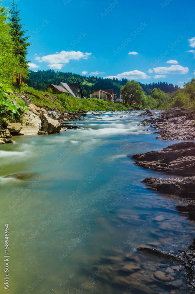 Background of Carpathian mountain river with long exposure Background of Carpathian mountain river with long exposure