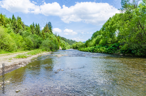 Background of Carpathian mountain river with long exposure photo