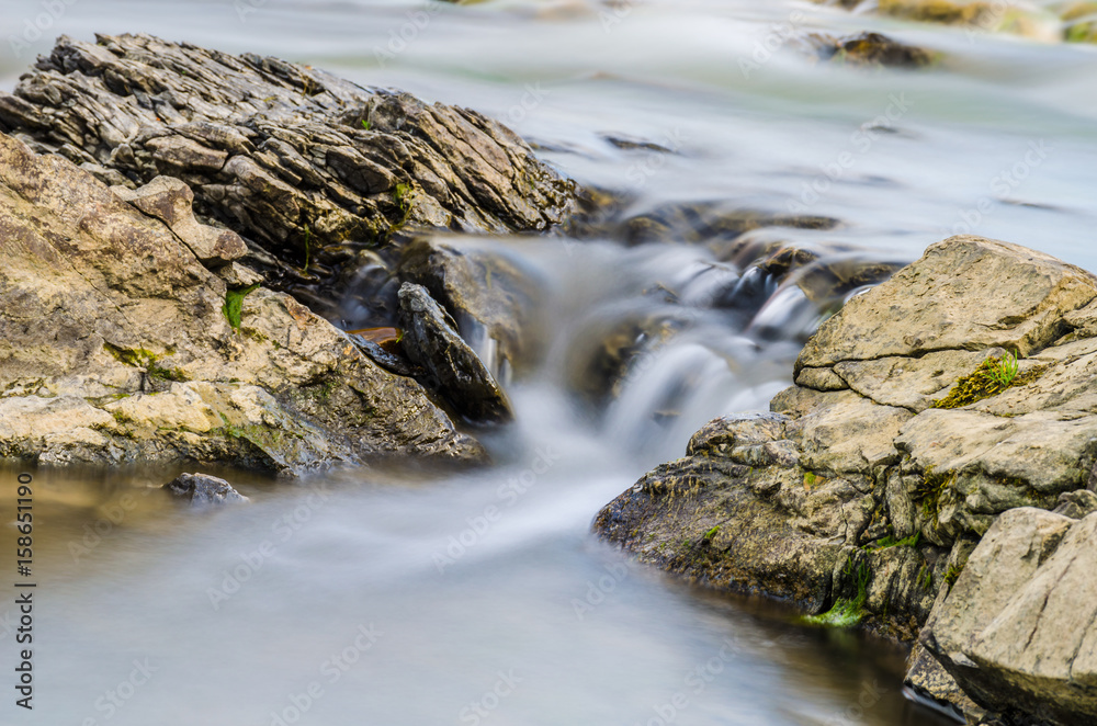 Background of Carpathian mountain river with long exposure Background of Carpathian mountain river with long exposure