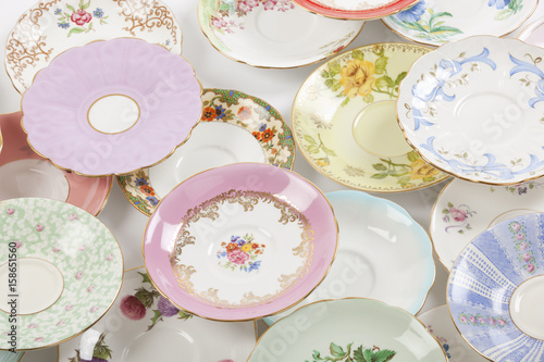 Photography Beautiful vintage tea cups and saucers collection, isolated on a white background
