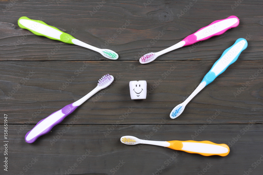 toothbrush tooth-brush on wood background. top view
